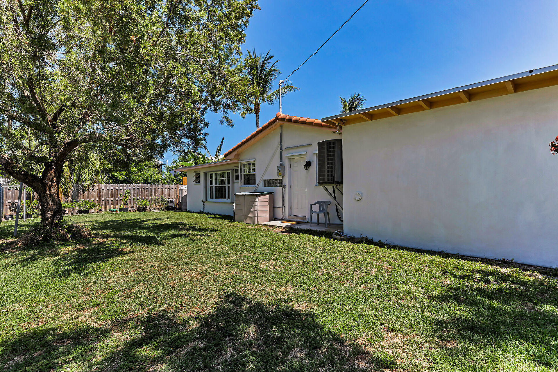 690 79th Street Marathon, FL 33050 - Photo 41 of 44 a view of a house with a yard