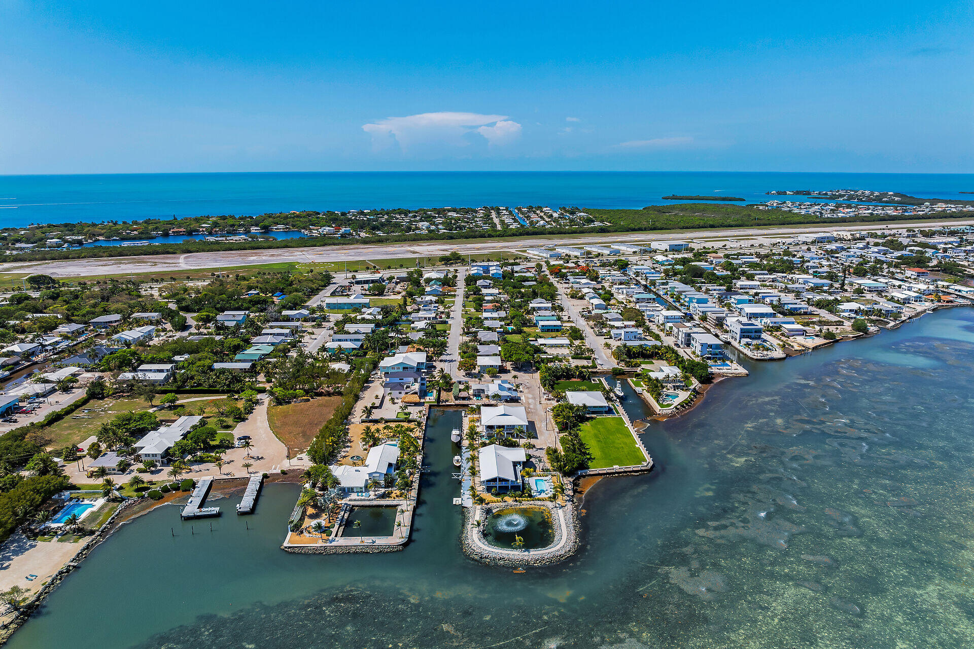 690 79th Street Marathon, FL 33050 - Photo 5 of 45 an aerial view of a city with ocean view