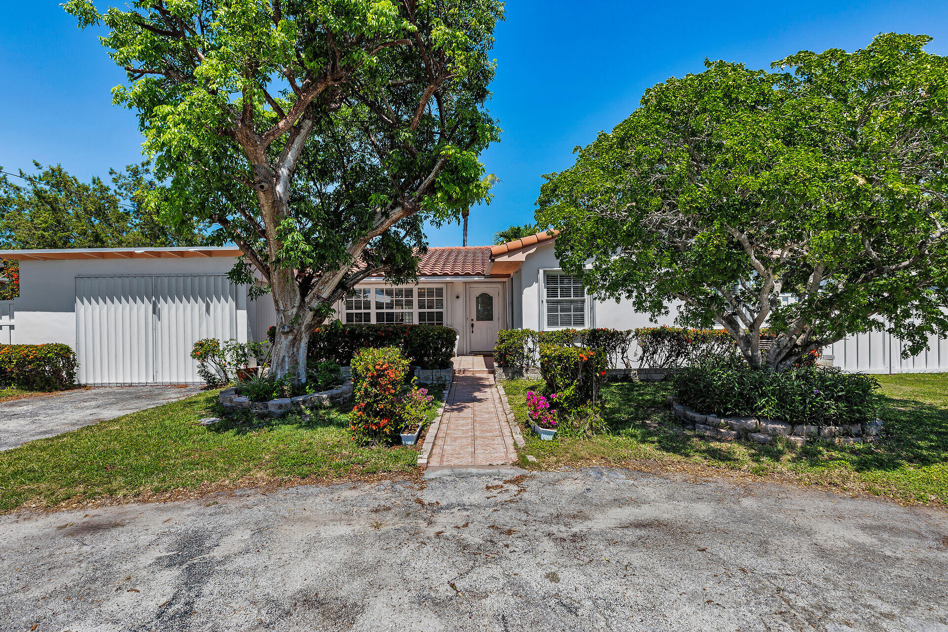 690 79th Street Marathon, FL 33050 - Photo 6 of 45 a view of a house with a yard and tree