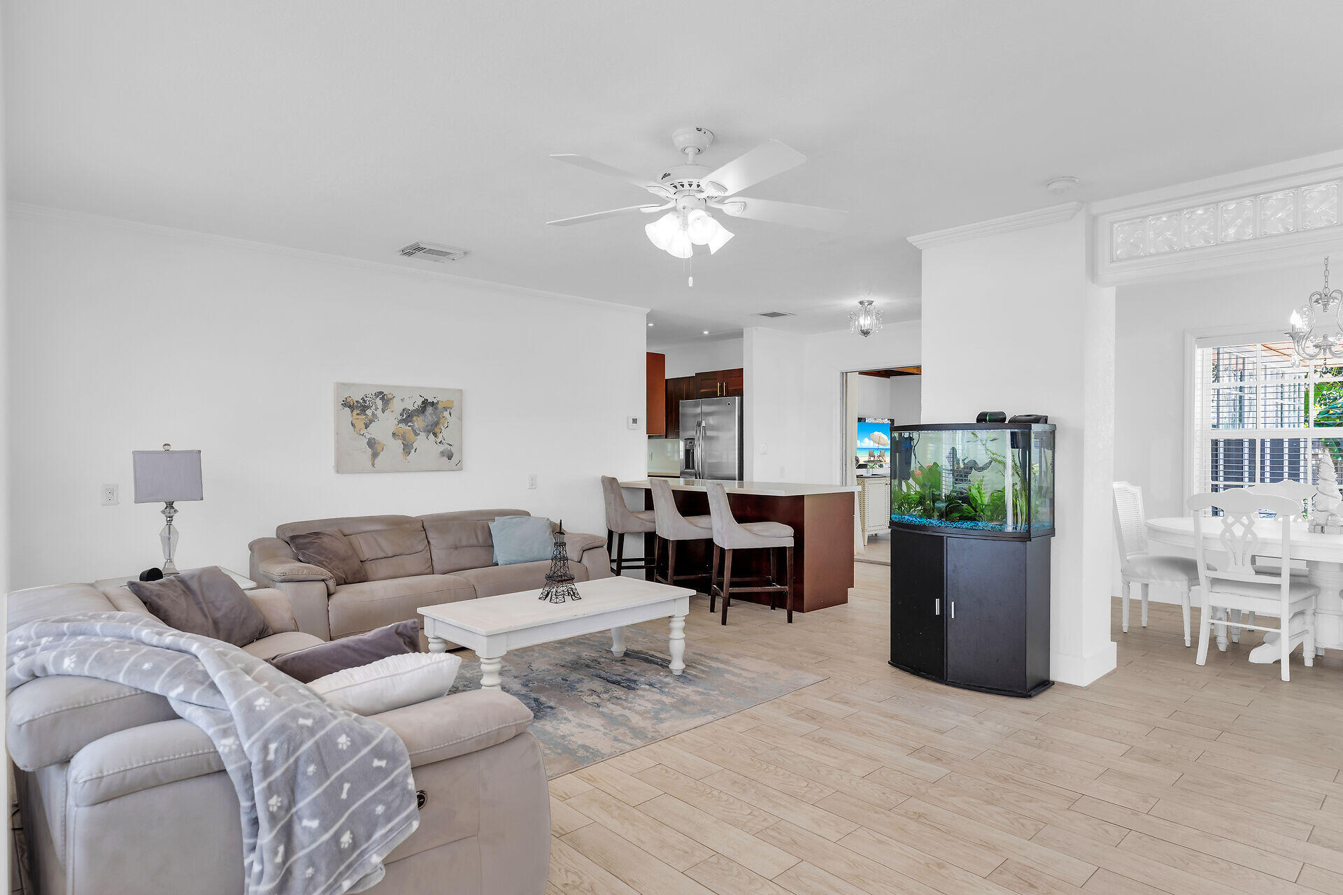 690 79th Street Marathon, FL 33050 - Photo 8 of 45 a living room with furniture and a dining room with window