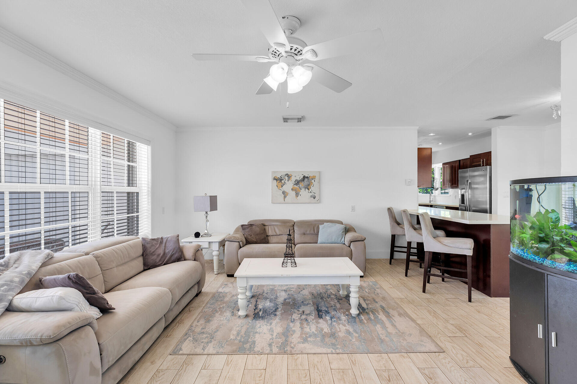 690 79th Street Marathon, FL 33050 - Photo 9 of 45 a living room with furniture a table and a chandelier