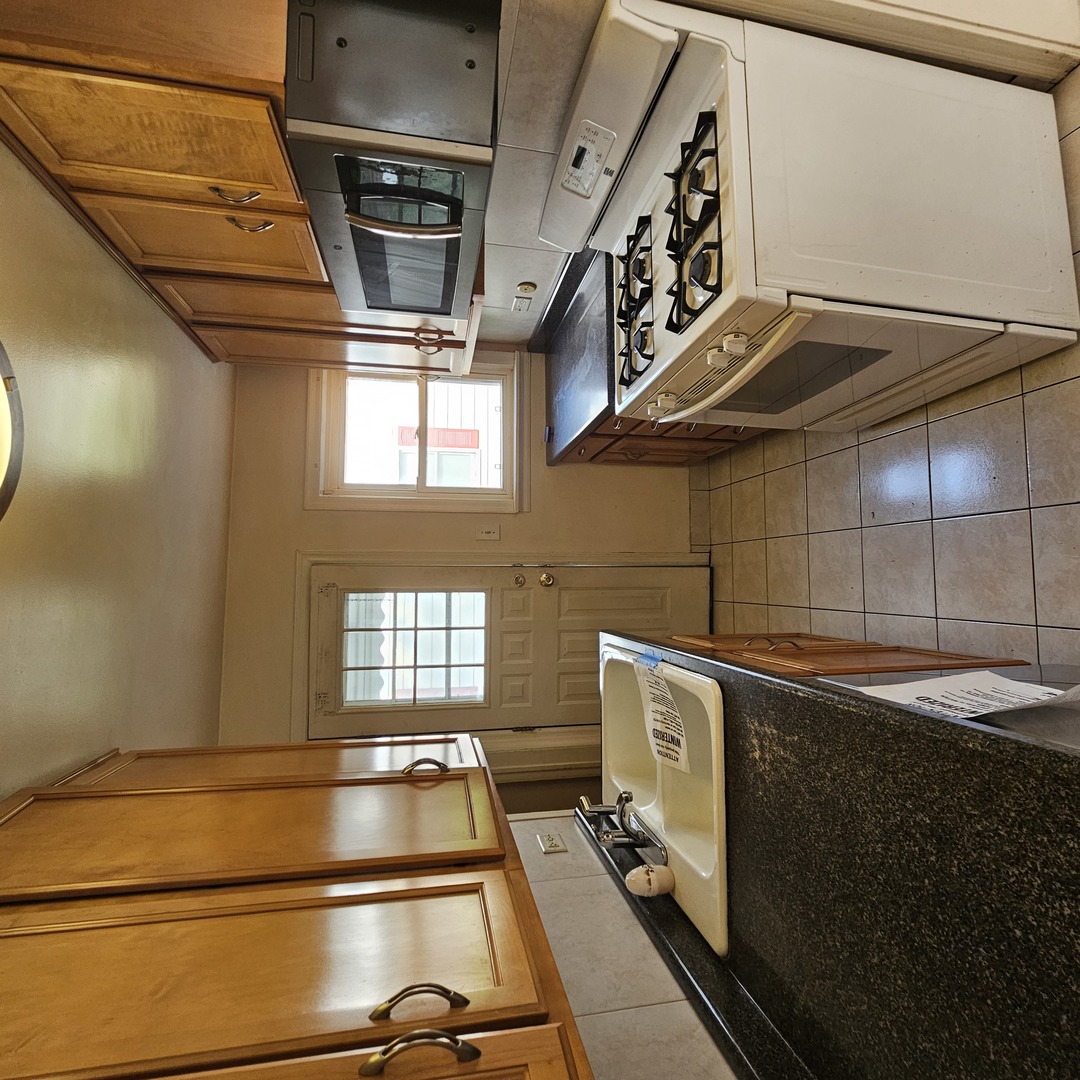 237 Pine Street Villa Park, IL 60181 - Photo 7 of 13 a view of an empty room with wooden floor