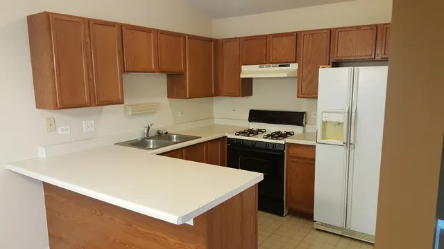 a view of a bathroom from a hallway