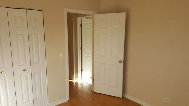 a view of a bathroom with wooden floor