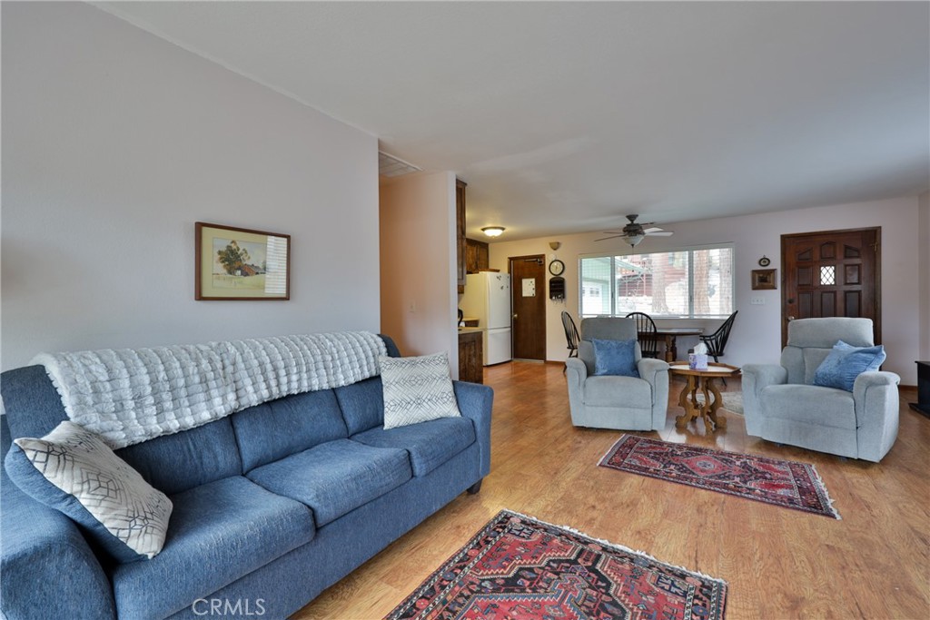39177 Arapahoe Road Fawnskin, CA 92333 - Photo 14 of 39 a living room with furniture or couch and a table