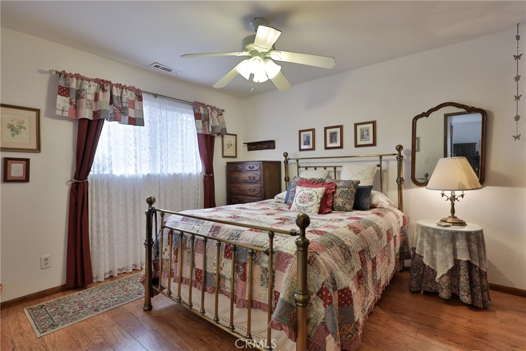 39177 Arapahoe Road Fawnskin, CA 92333 - Photo 17 of 39 a bedroom with bed and a window