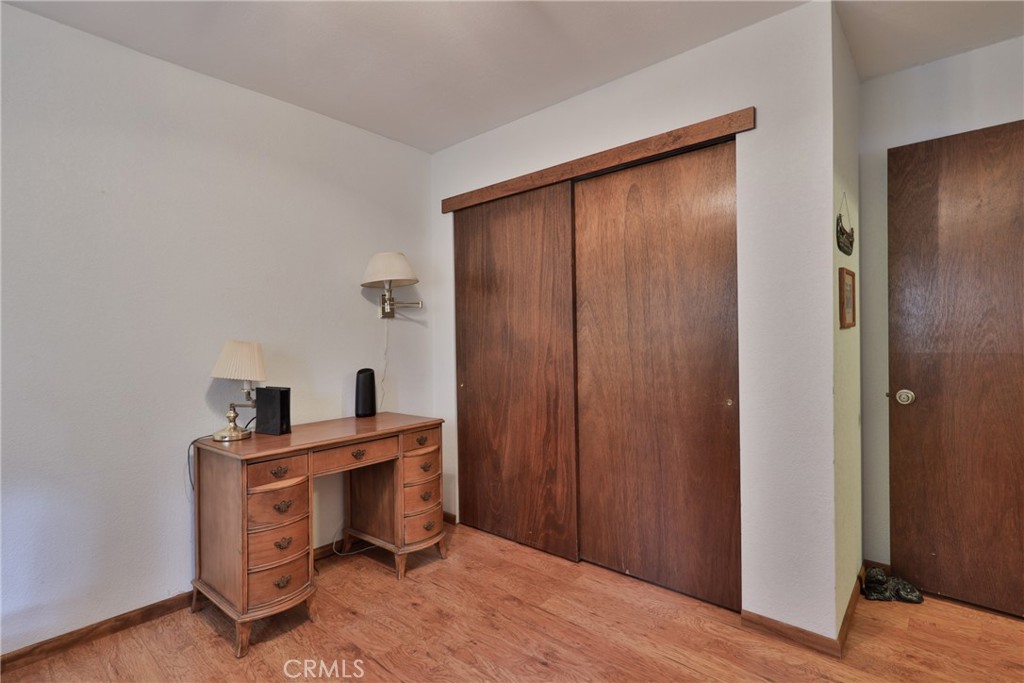 39177 Arapahoe Road Fawnskin, CA 92333 - Photo 25 of 39 a view of a workspace with furniture and wooden floor