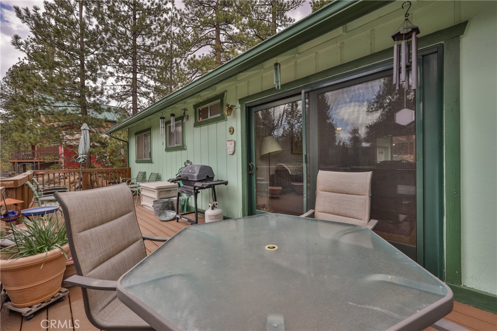 39177 Arapahoe Road Fawnskin, CA 92333 - Photo 28 of 39 a outdoor living space with furniture and a potted plant