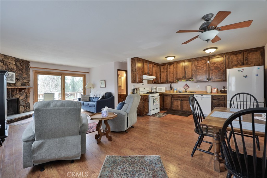 39177 Arapahoe Road Fawnskin, CA 92333 - Photo 7 of 39 a living room with furniture and kitchen view