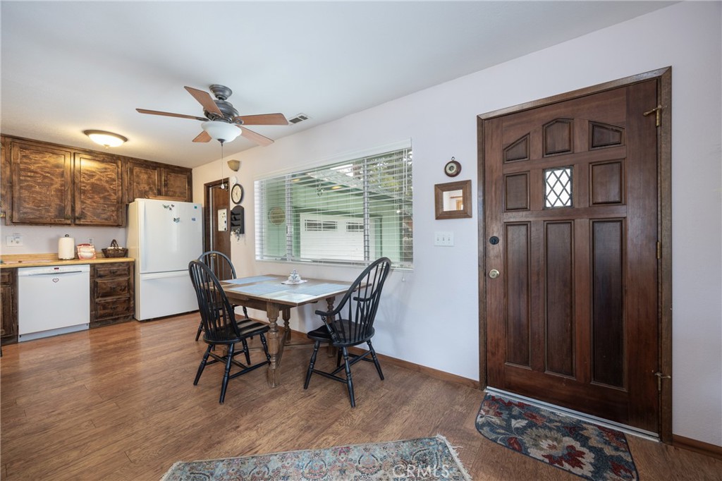 39177 Arapahoe Road Fawnskin, CA 92333 - Photo 8 of 39 a view of a dining room with furniture and window
