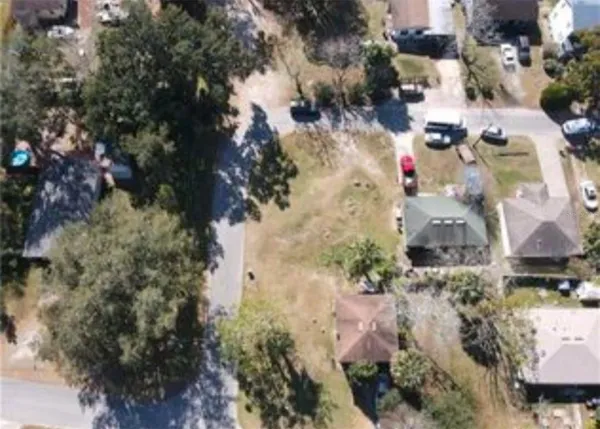an aerial view of waterside residential houses with outdoor space