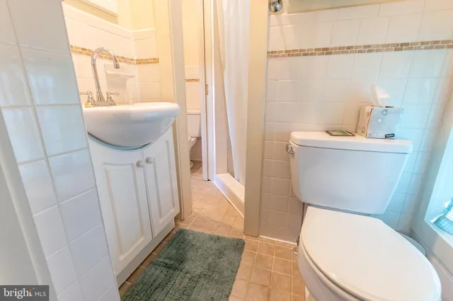 a bathroom with a sink and a toilet