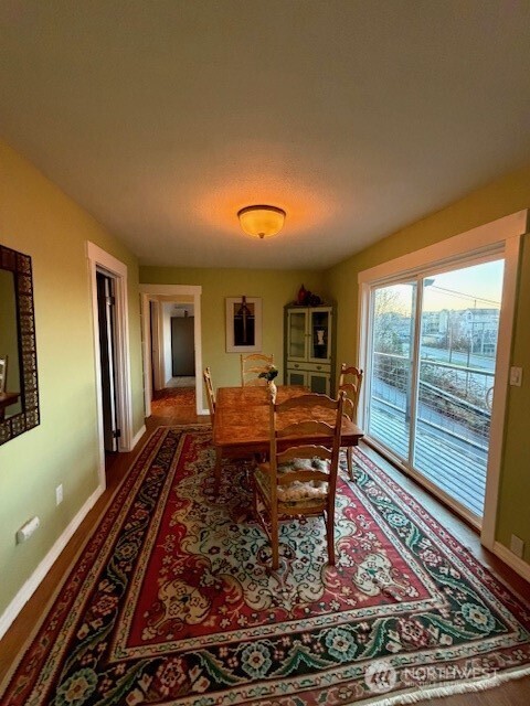 310 East Ivy Street Bellingham, WA 98225 - Photo 12 of 34 a living room with a couch and wooden floor