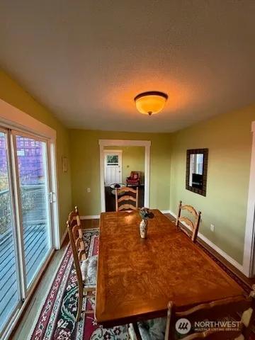 a bed room with a bed and a lamp