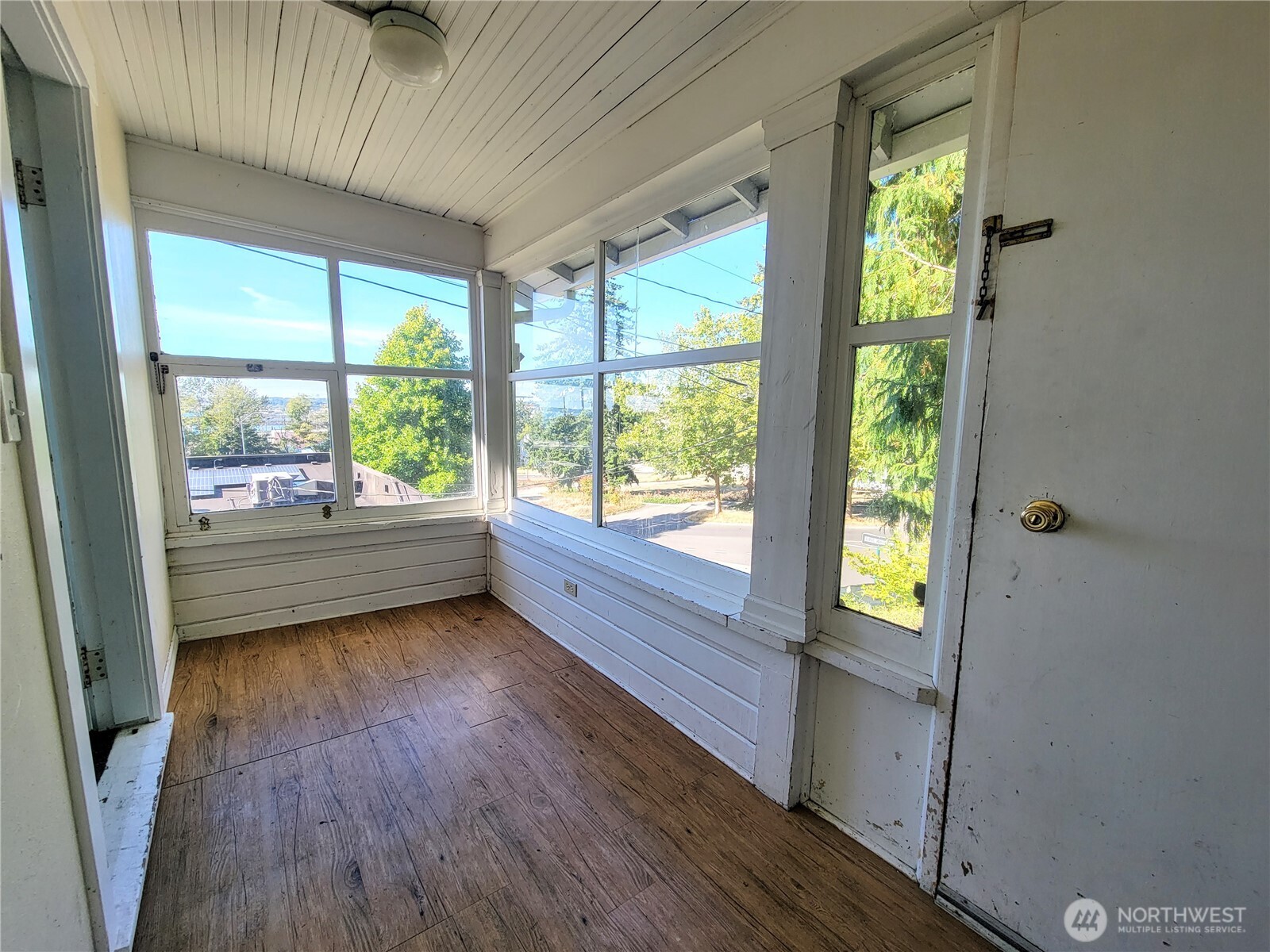 310 East Ivy Street Bellingham, WA 98225 - Photo 6 of 34 a view of a room window and wooden floor