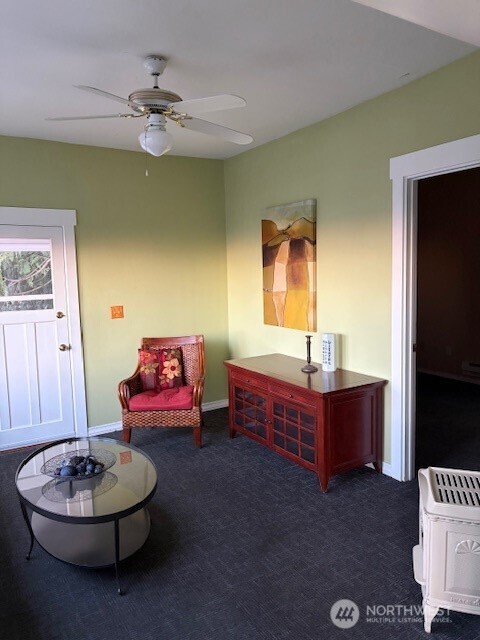 310 East Ivy Street Bellingham, WA 98225 - Photo 10 of 34 a living room with furniture and a wooden floor