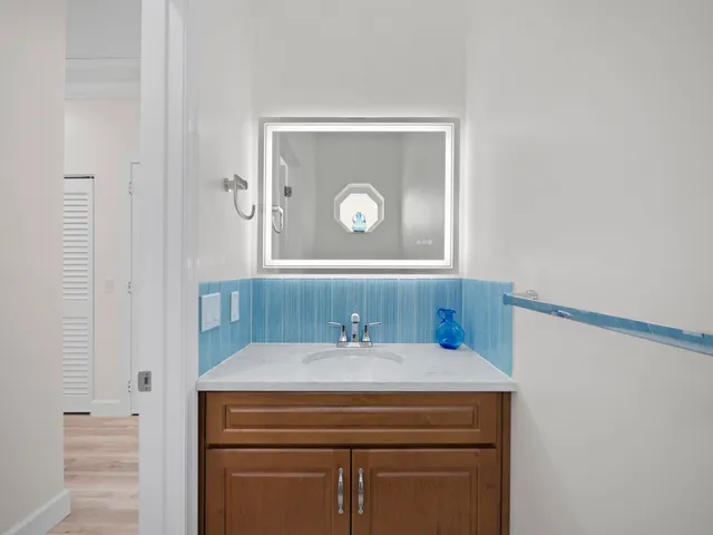 a view of a house with a yard and garage