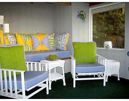459 Ocean Point Road East Boothbay, ME 04544 - Photo 9 of 17 Patio/Deck. Cottage screened porch