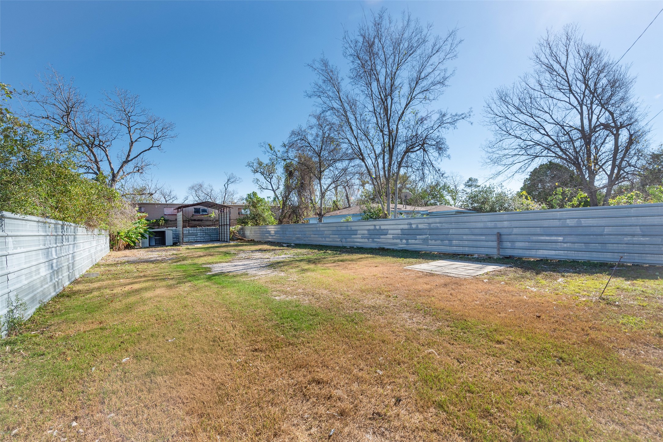 3930 Pickfair Street Houston, TX 77026 - Photo 14 of 19 a view of yard with swimming pool and trees
