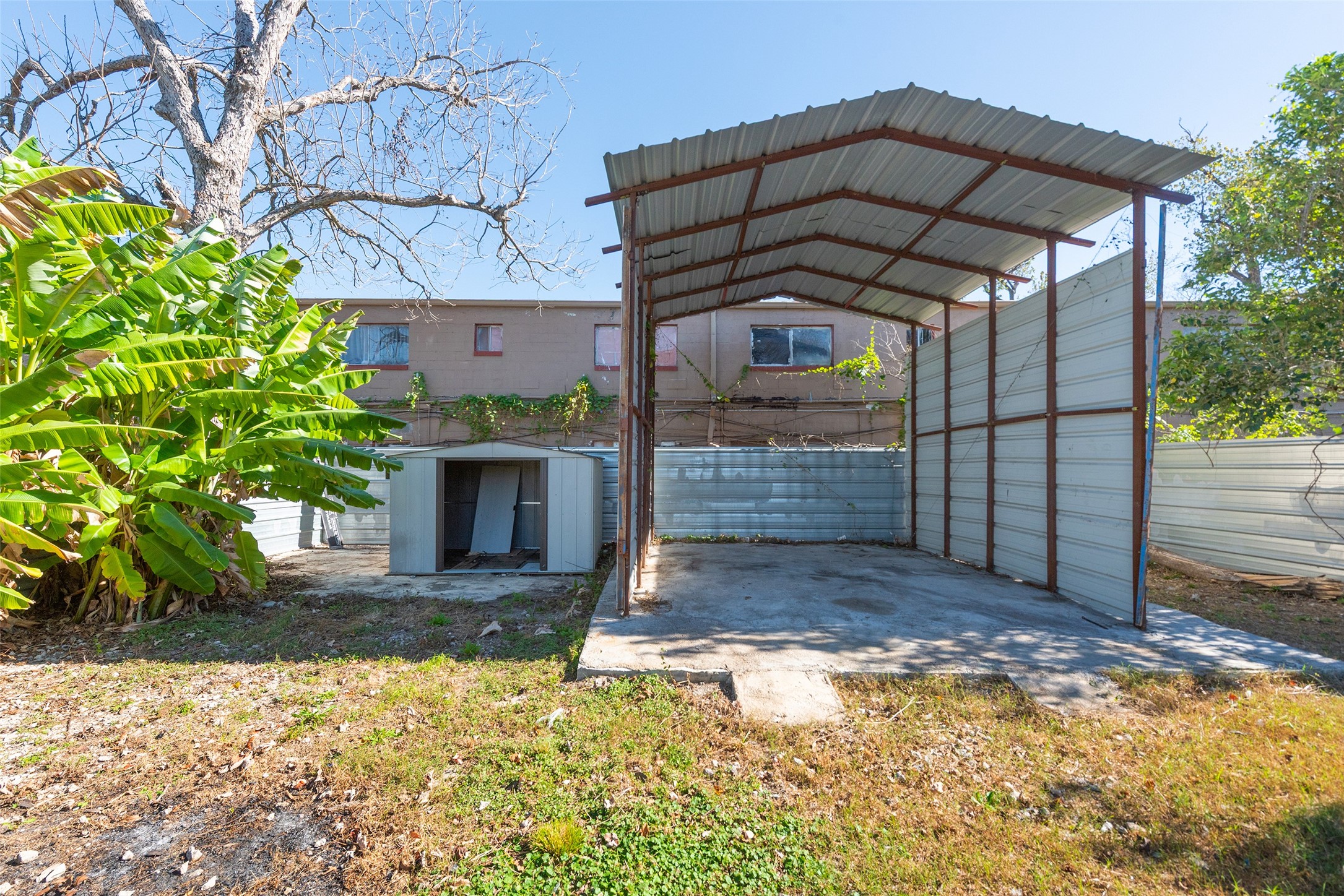 3930 Pickfair Street Houston, TX 77026 - Photo 17 of 19 a view of a brick house with a small yard