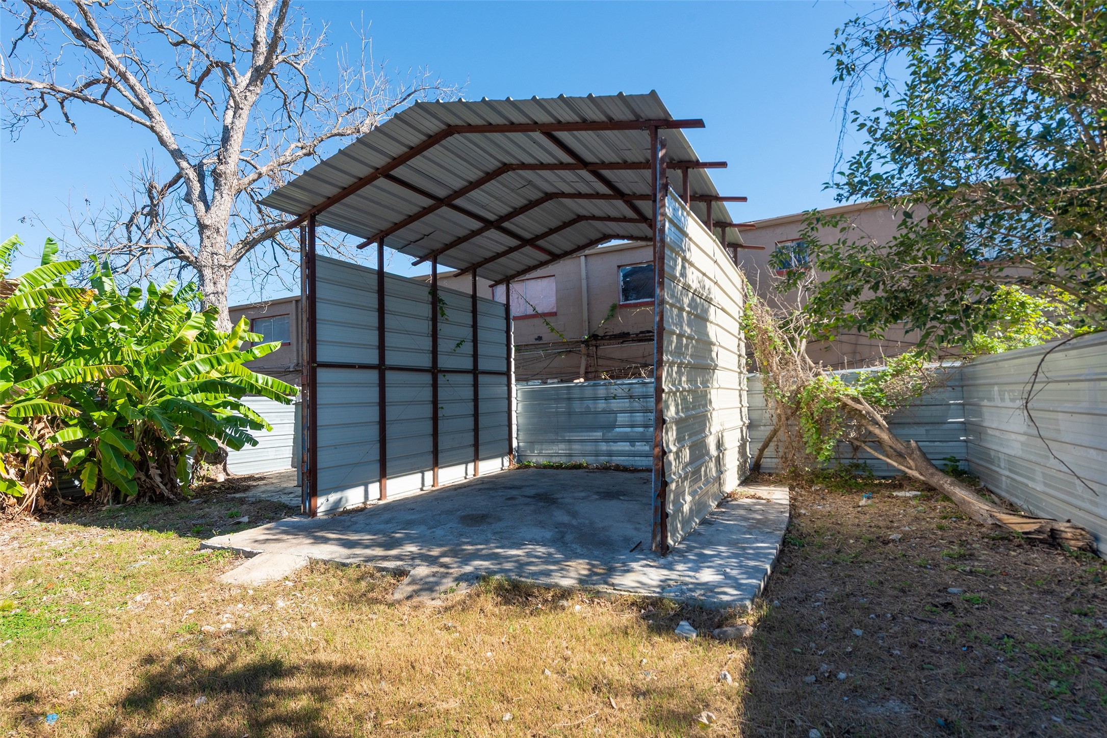 3930 Pickfair Street Houston, TX 77026 - Photo 4 of 19 a view of a wooden door and a yard