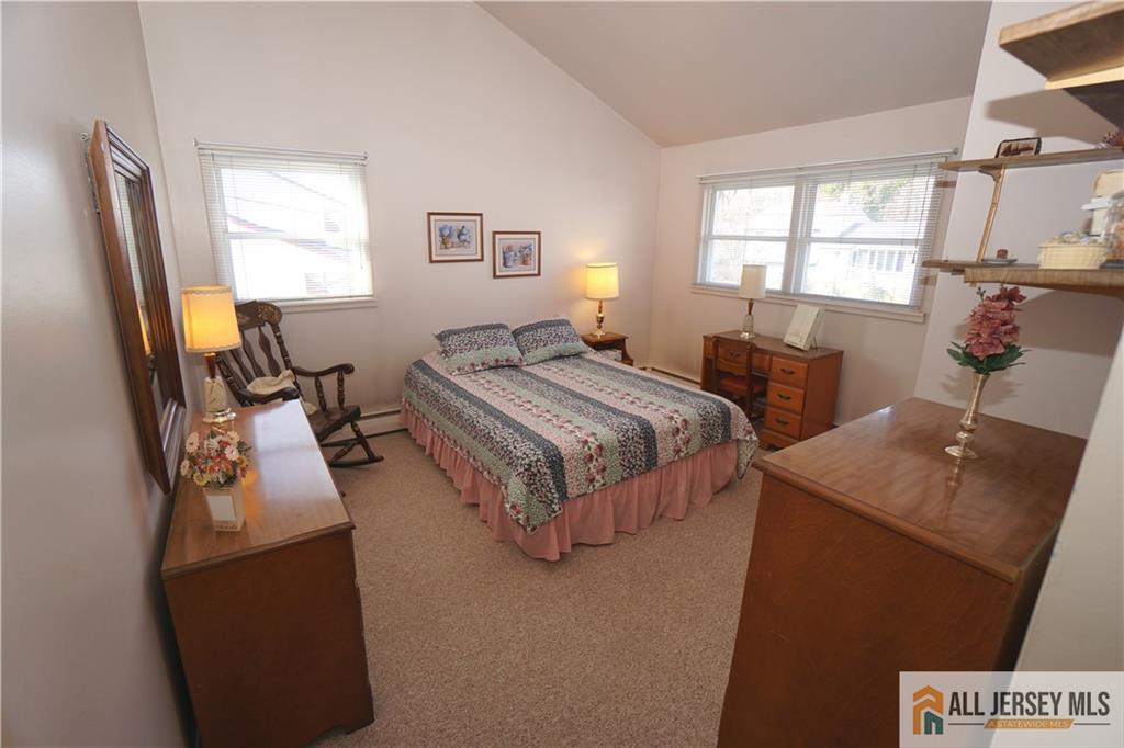 32 Predmore Avenue Colonia, NJ 07067 - Photo 14 of 28 a bedroom with bed and window