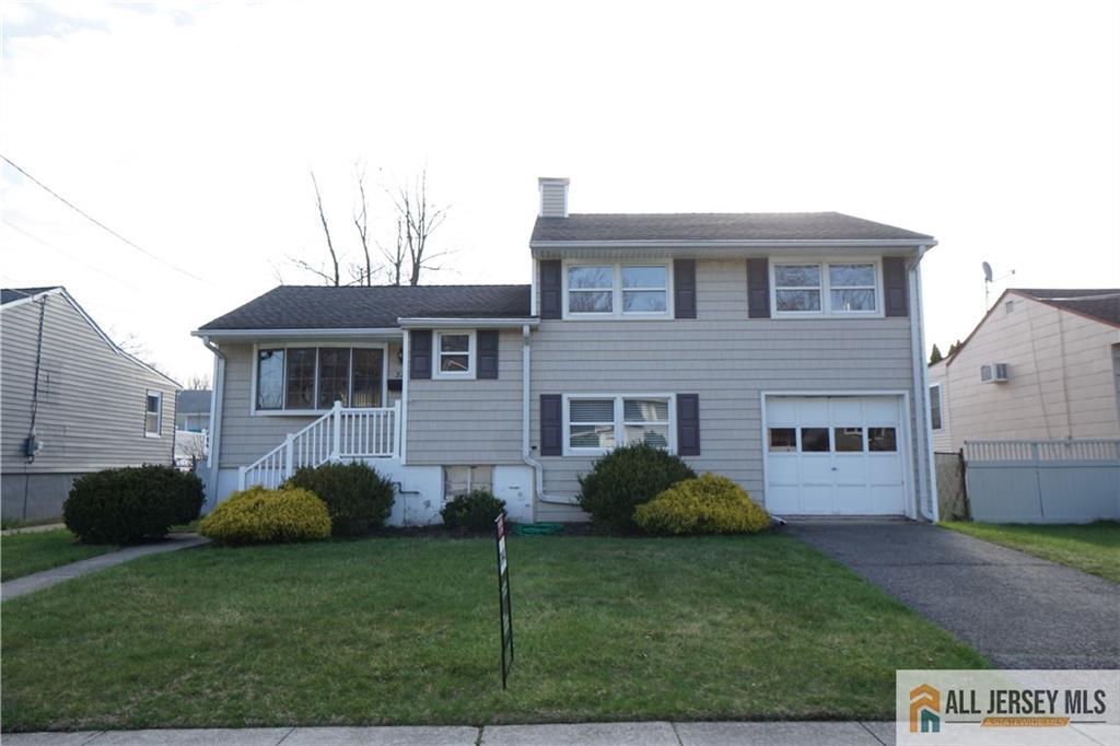 32 Predmore Avenue Colonia, NJ 07067 - Photo 2 of 28 a view of a house with a backyard