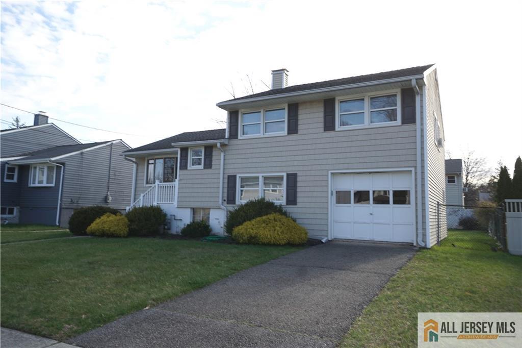 32 Predmore Avenue Colonia, NJ 07067 - Photo 24 of 28 a house view with a garden space