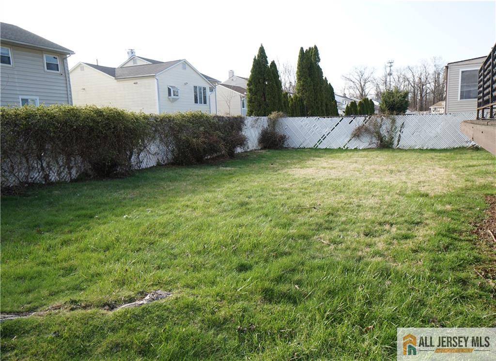 32 Predmore Avenue Colonia, NJ 07067 - Photo 26 of 28 a view of a house with a yard