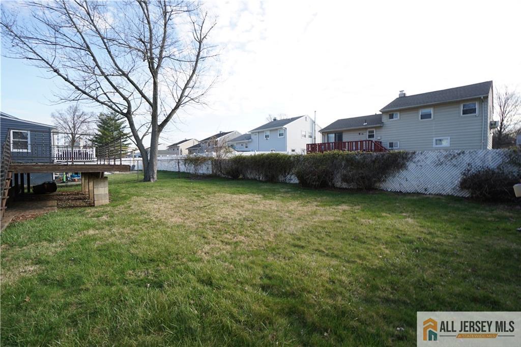 32 Predmore Avenue Colonia, NJ 07067 - Photo 27 of 28 a view of a house with a yard