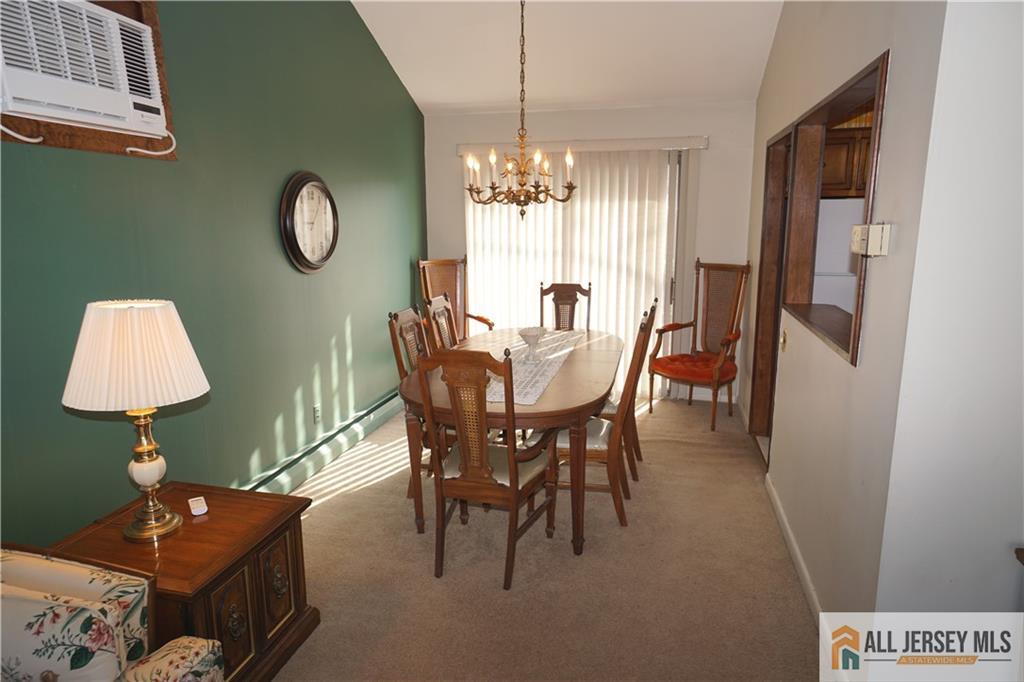 32 Predmore Avenue Colonia, NJ 07067 - Photo 8 of 28 a dining room with furniture and window