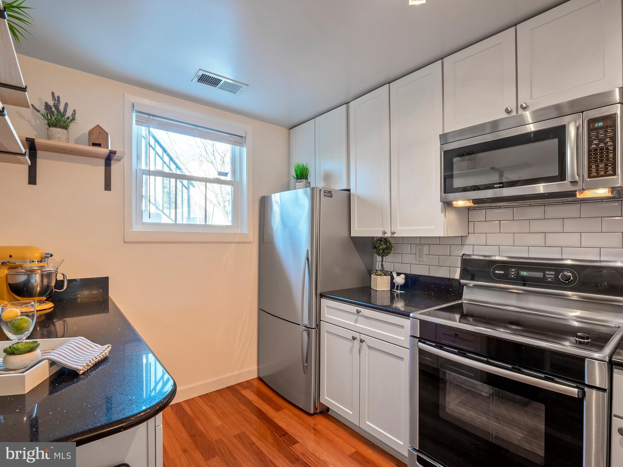 3902 9th Road South Arlington, VA 22204 - Photo 8 of 45 Subway Tile Backsplash and Silestone Countertops