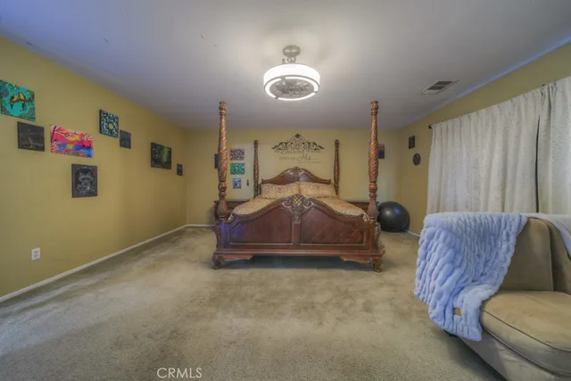 a bathroom with a shower and a sink