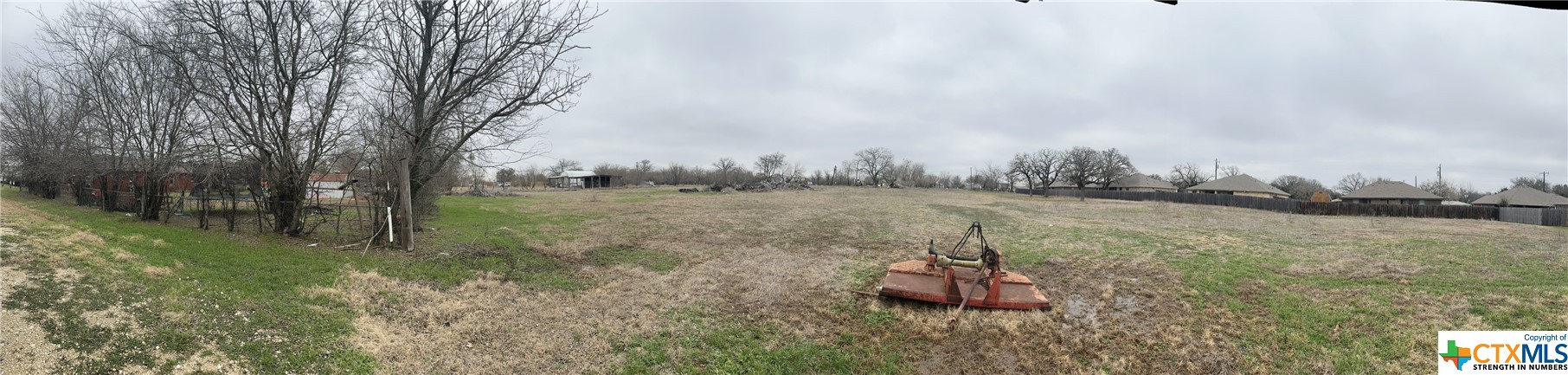 246 Old Waco Road Gatesville, TX 76528 - Photo 8 of 8 a view of a lake with a big yard and large trees