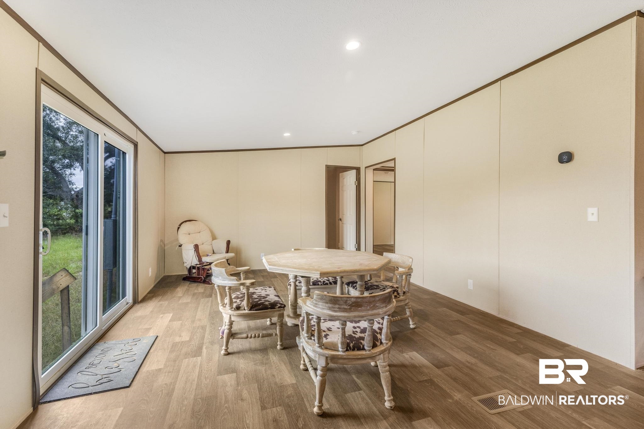 54309 Klasnich Road Perdido, AL 36562 - Photo 12 of 29 Dining area with recessed lighting and wood finished floors