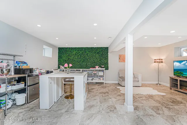 a view of a kitchen and dining room