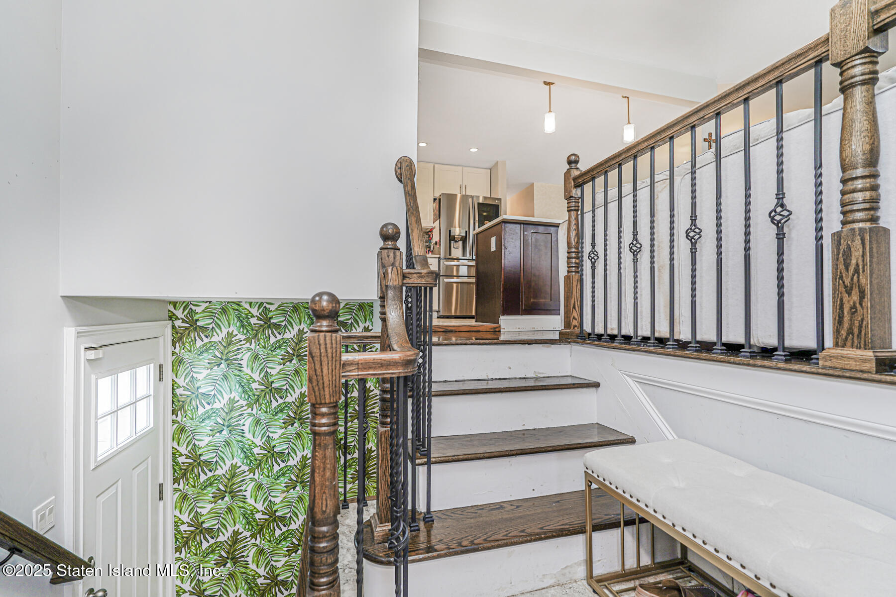 28 Drumgoole Road East Staten Island, NY 10312 - Photo 3 of 28 a view of entryway and hall with wooden floor