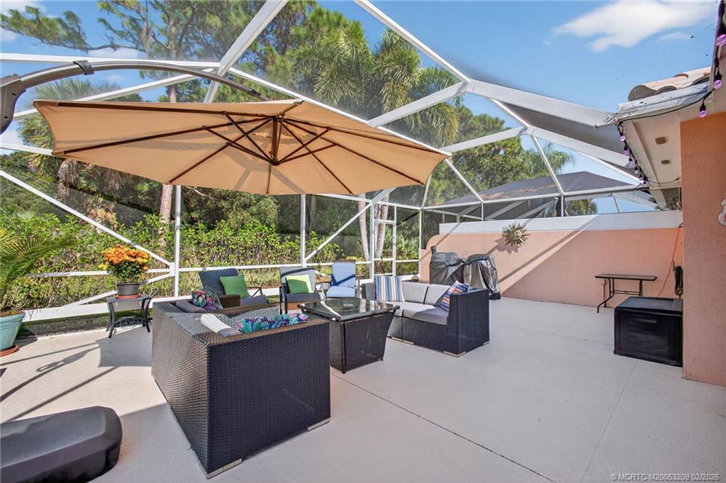 1035 Southwest Tamarrow Place Stuart, FL 34997 - Photo 2 of 46 Enjoy outdoor Florida living