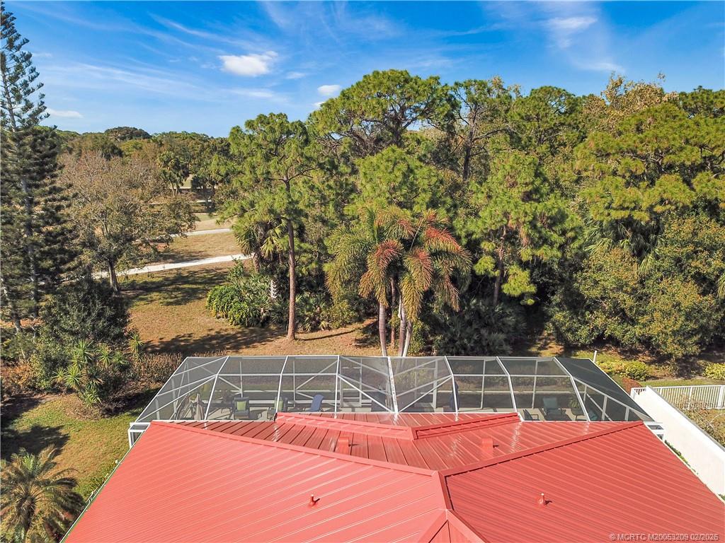 1035 Southwest Tamarrow Place Stuart, FL 34997 - Photo 41 of 46 Private setting with a peek of the golf course