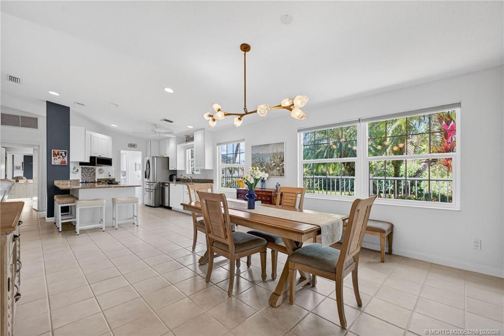 1035 Southwest Tamarrow Place Stuart, FL 34997 - Photo 7 of 46 Designer light fixture adds to the ambiance