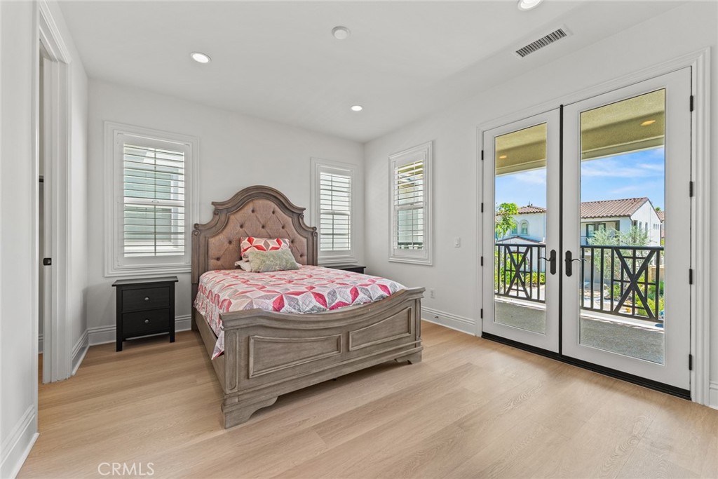 115 Mustard Irvine, CA 92618 - Photo 69 of 74 a bedroom with a bed and a window