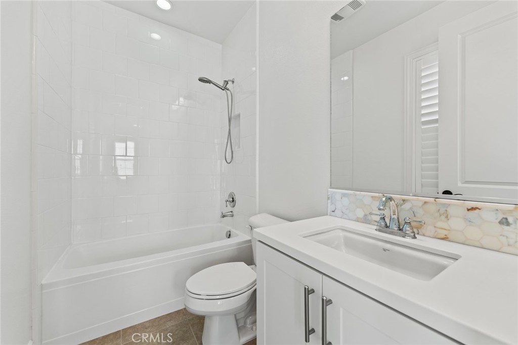 115 Mustard Irvine, CA 92618 - Photo 71 of 74 a bathroom with a sink toilet and shower
