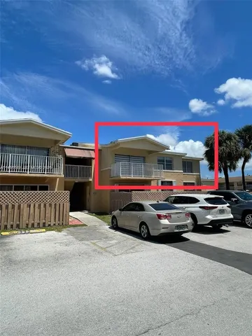 a car parked in front of a building