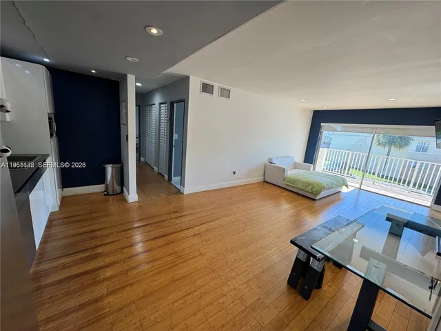 a view of livingroom with furniture and wooden floor
