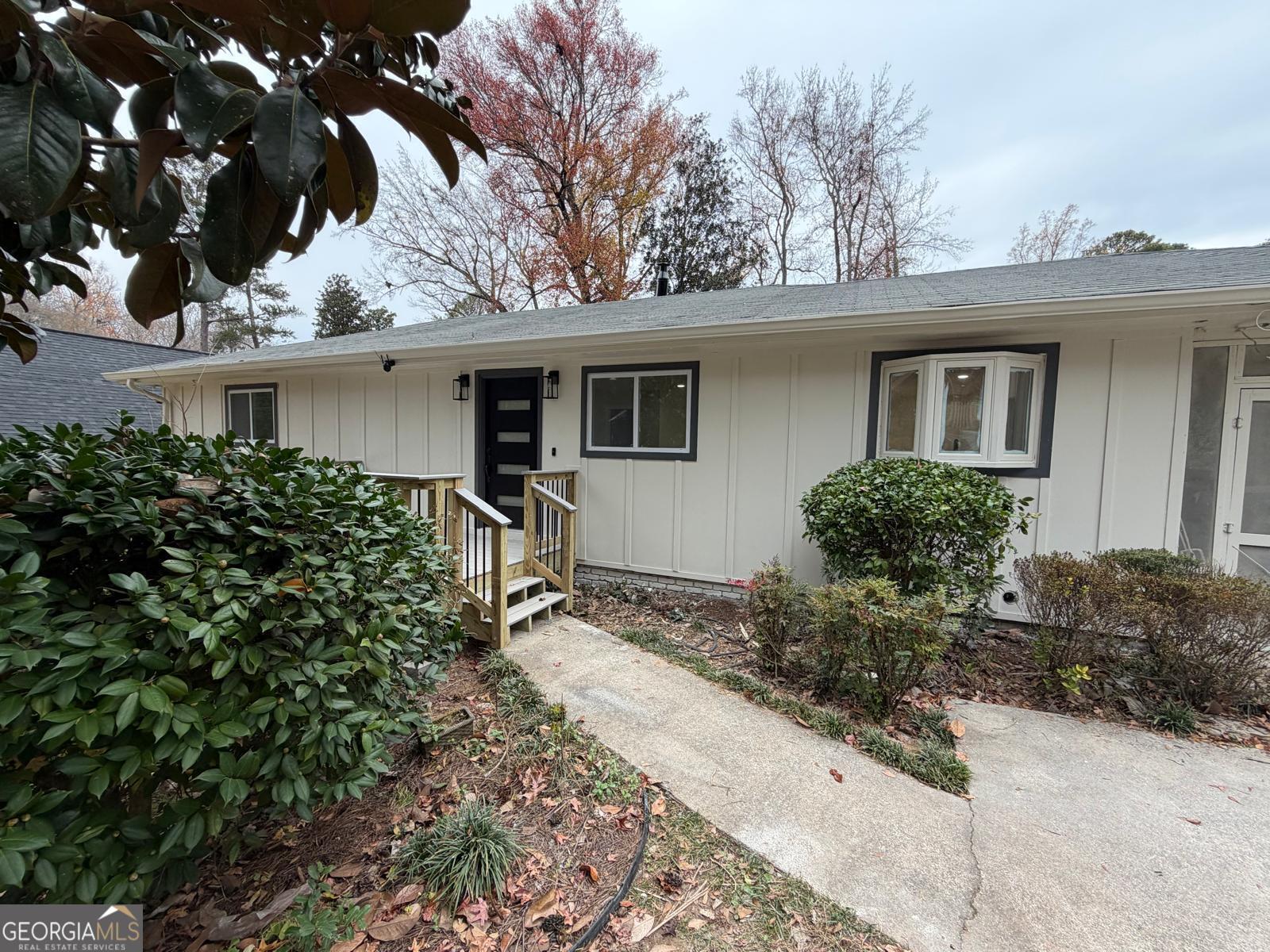 a house view with a outdoor space