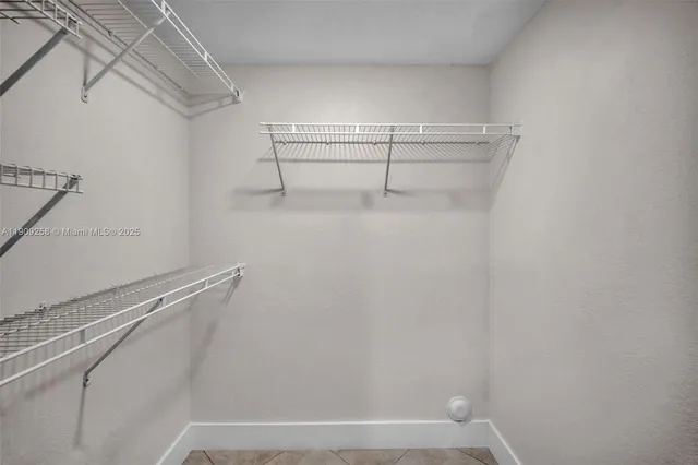 a view of a room with racks on the wall