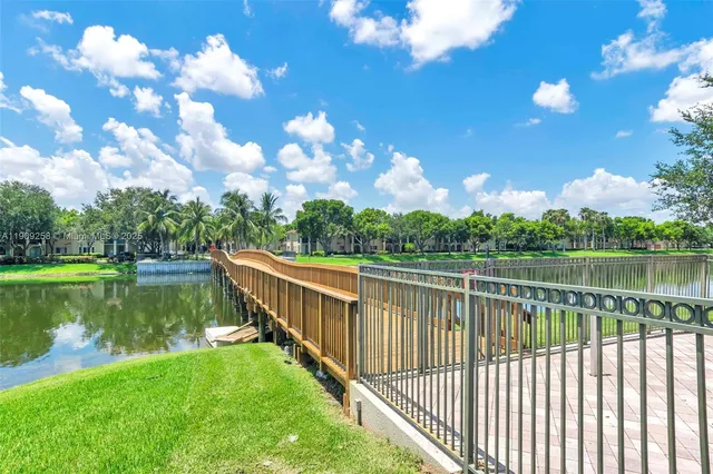 a view of a lake with a yard