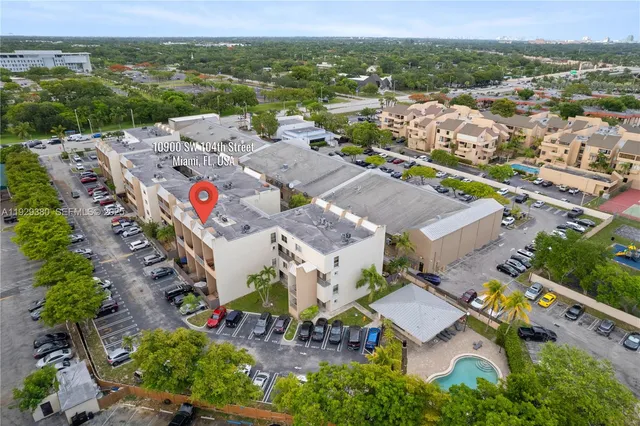 an aerial view of a city with lots of residential buildings