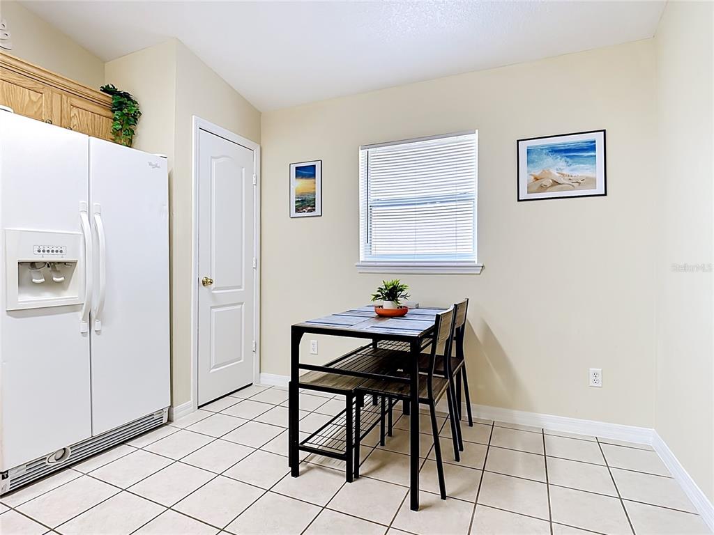 522 Sandy Ridge Drive Davenport, FL 33896 - Photo 12 of 34 a view of a workspace with furniture