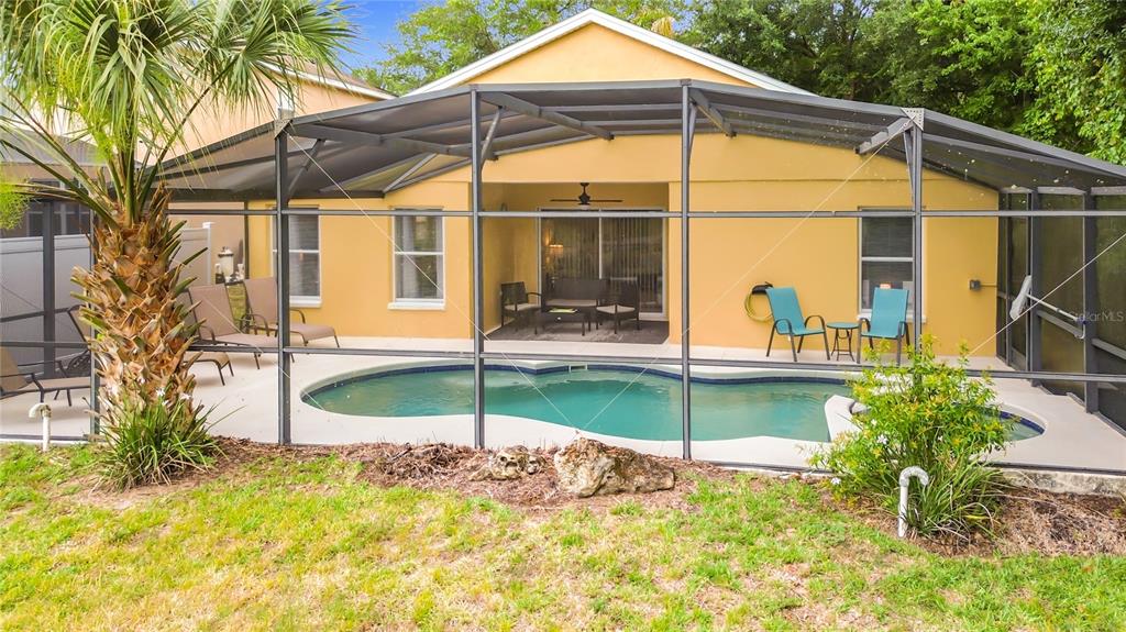 522 Sandy Ridge Drive Davenport, FL 33896 - Photo 6 of 34 a house view with a outdoor space